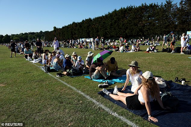 Fans in the queue were faced with intense heat with temperatures reaching 32C yesterday