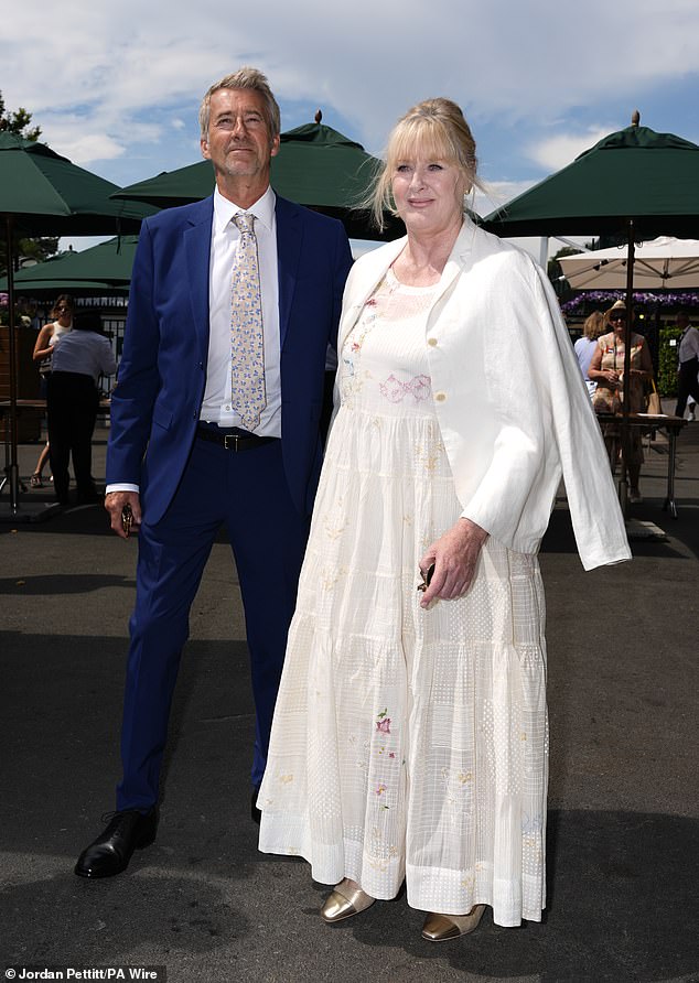 The actress, 60, was the picture of elegance in a floaty white summer dress as she braved the blistering heatwave during the outing at the All England Lawn Tennis and Croquet Club