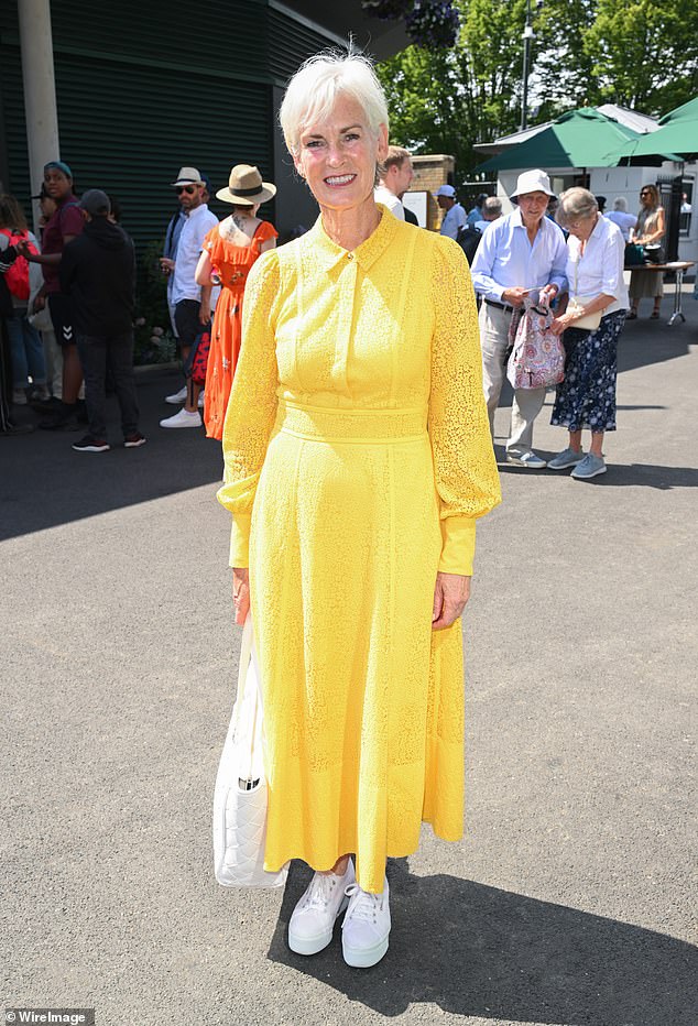 Meanwhile, Judy Murray - mother of tennis ace Andy - was clad in a bright yellow lace shirt dress and white trainers