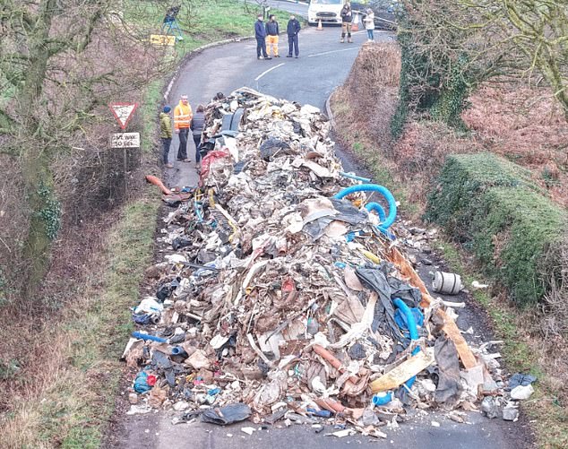 The dump meant residents were unable to leave the hamlet by vehicle  as the other end of the lane had been been closed for roadworks connected with the construction of a new housing estate