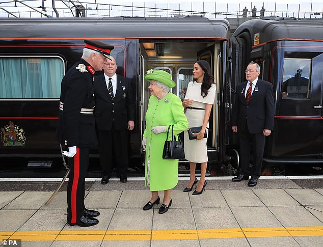 The late Queen, pictured with the royal train in 2018, gave Charles an Aston Martin, in ¿Seychelles Blue¿ for his 21st Birthday in 1969