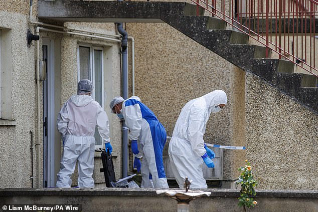 Officers were called to the home at 2.15pm after receiving reports of an unconscious female with a serious injury. Paradmedics were unable to save her and she was pronounced dead at the scene. Pictured: Forensics at the home