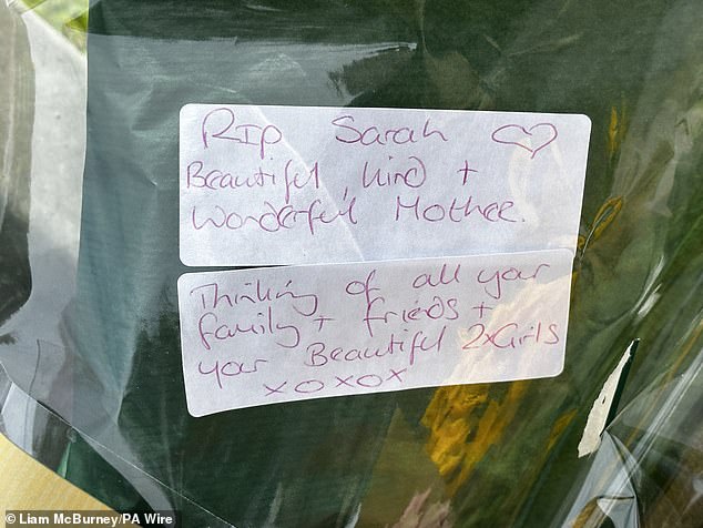 Message on a floral tribute placed in Elmfield Walk area of Donaghadee, Co Down, after a murder investigation was launched after the body of pregnant mother-of-two Sarah Montgomery