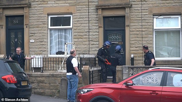 To achieve the element of surprise and prevent any evidence being lost, a kinetic steel battering ram - called The Enforcer - was used to break in