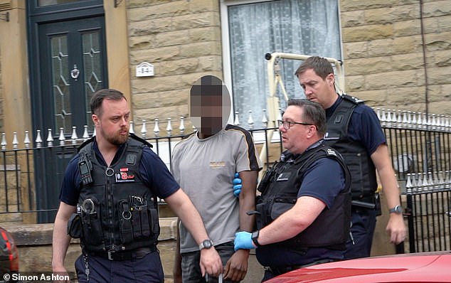 He was led out by police around half an hour later to a waiting custody and taken to a local police station for questioning