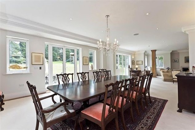 Estate agents describe the striking three-storey property as 'a generous and welcoming' family home