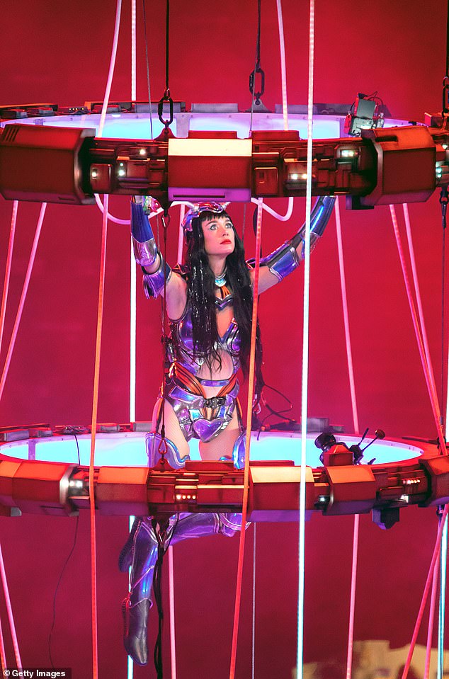 The floating orb then tilted, as seen in fan-taken footage, and she scrambled to hold on to avoid falling into the crowd; pictured April in Monterrey, Mexico