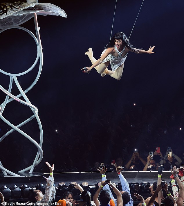 For several long seconds, Perry held onto one of the bars before the crew stopped the lights and music before rushing to help her; pictured April in Mexico City