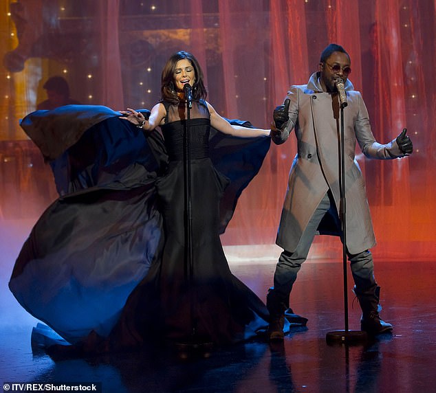 A source said: 'Will.i.am and Cheryl first worked together 16 years ago and have remained good friends ever since' (Seen in 2009)