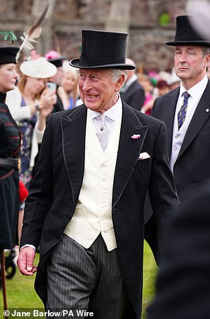 Father-of-two Charles beamed as he entered the garden party in Scotland on Tuesday afternoon