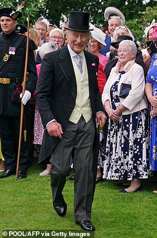 Father-of-two Charles beamed as he entered the garden party in Scotland on Tuesday afternoon
