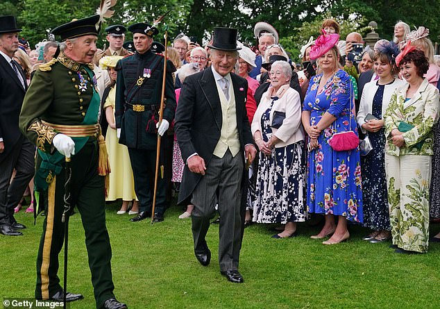 Crowds politely lined up as they watched the royal enter the garden party on Tuesday afternoon