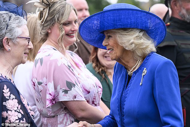77-year-old Camilla beamed as she met attendees during today's event in Scotland's Edinburgh