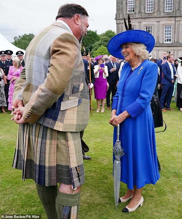 Camilla giggled as she chatted with one male attendee, who donned a traditional kilt for the occasion