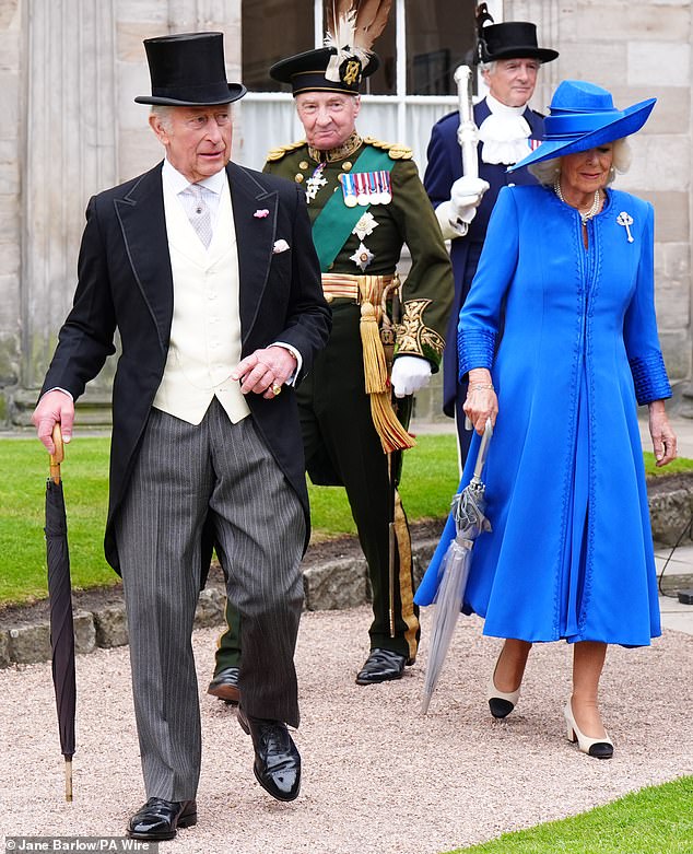 Pictured: King Charles and Queen Camilla during the Sovereign's Garden Party at the Palace of Holyroodhouse in Edinburgh