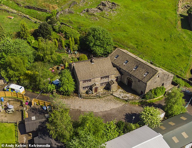Police at Carr Farm in Milnrow, near Rochdale, following Daniel Twigg's death there on May 16, 2022