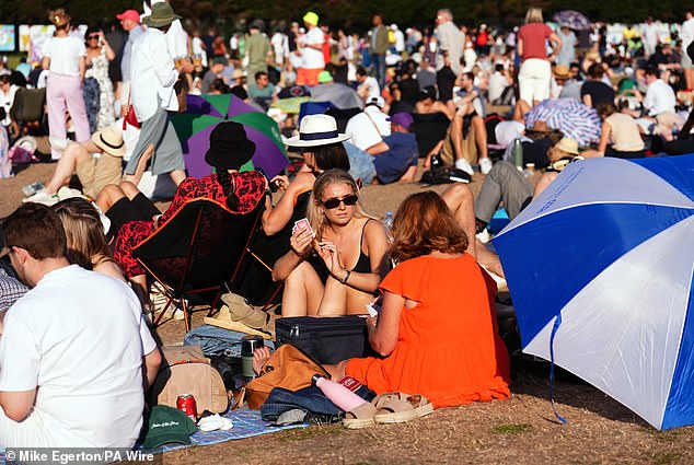 Spectators in the queue on day two of the 2025 Wimbledon Championships yesterday morning