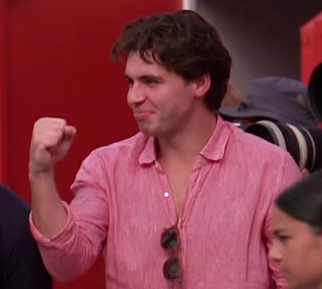 Pictured: Former tennis prodigy Benjamin Heynold cheering on Ms Raducanu alongside her coach Nick Cavaday and agent Thomas Houchin as she reached the quarter-finals