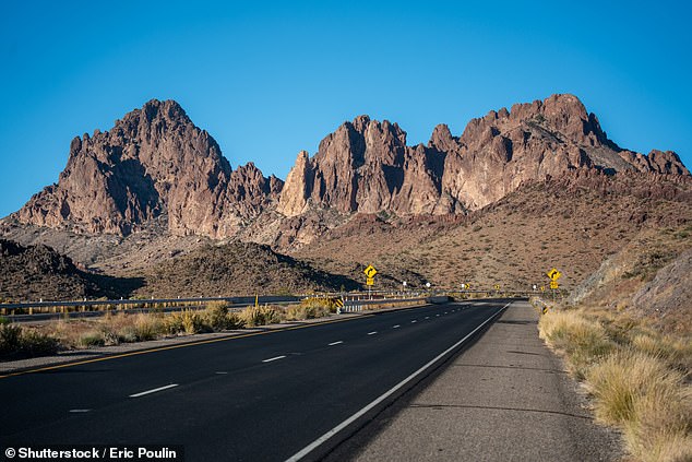 The iconic 2,448-mile highway connects Chicago to Los Angeles. It scythes through America's heartland, including Arizona's Black Mountains (pictured)