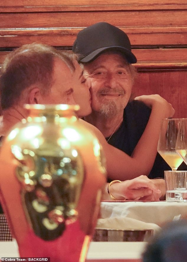 Pacino beamed as he received a smooch from the Italian journalist Caterina Di Terlizzi, who is several decades younger than the Godfather star. He gave her a hug afterward