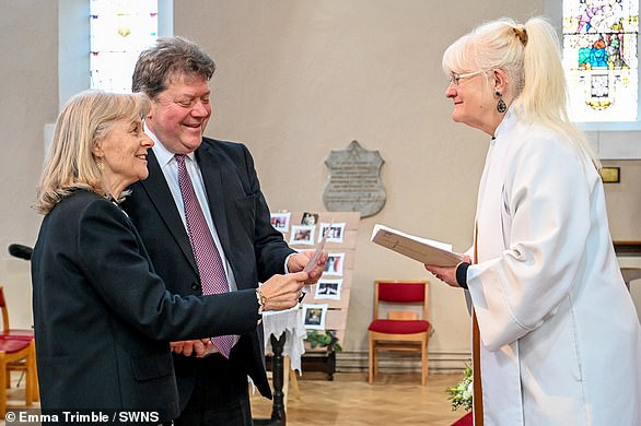 The couple are pictured renewing their vows at the church where they were wed in 1991