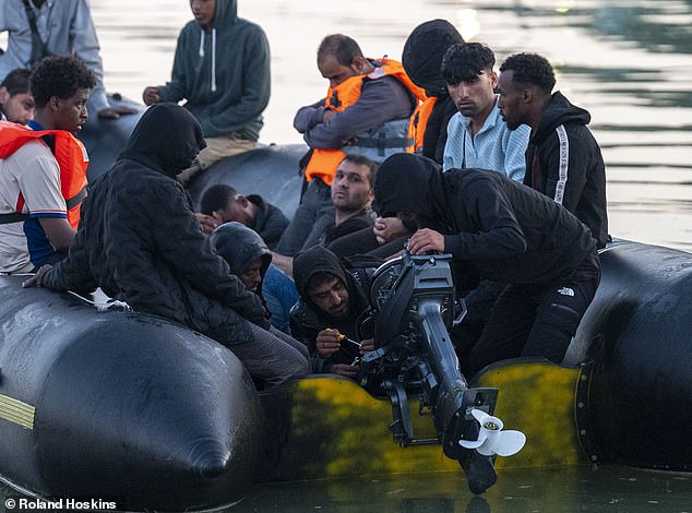 Pictured: A migrant small boat at Gravelines, 1st July 2025, as up to 100 migrants wait to board, the boat suffers from engine failure and fails to get underway, watched on by police