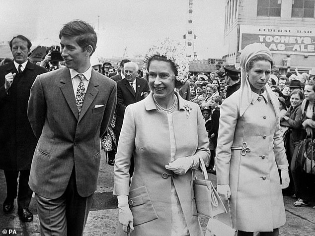The late Queen with Anne and Charles as they passed through the crowds at the Royal Easter Show in Sydney during the Royal Tour of Australasia