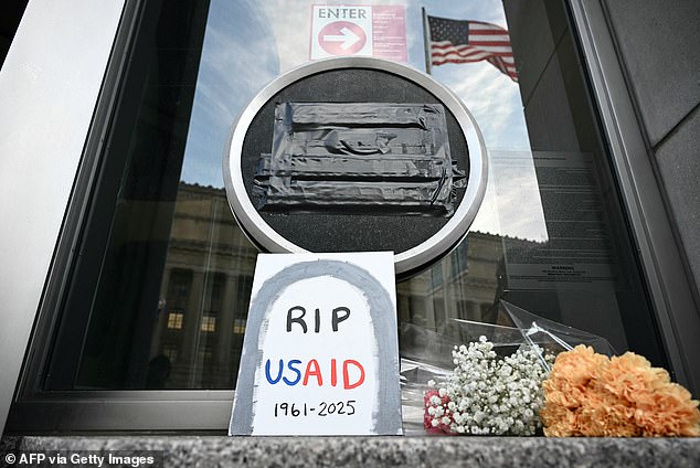 Some people lay tributes which read 'RIP USAID' in February this year after the Trump administration signaled their intention to gut the programs