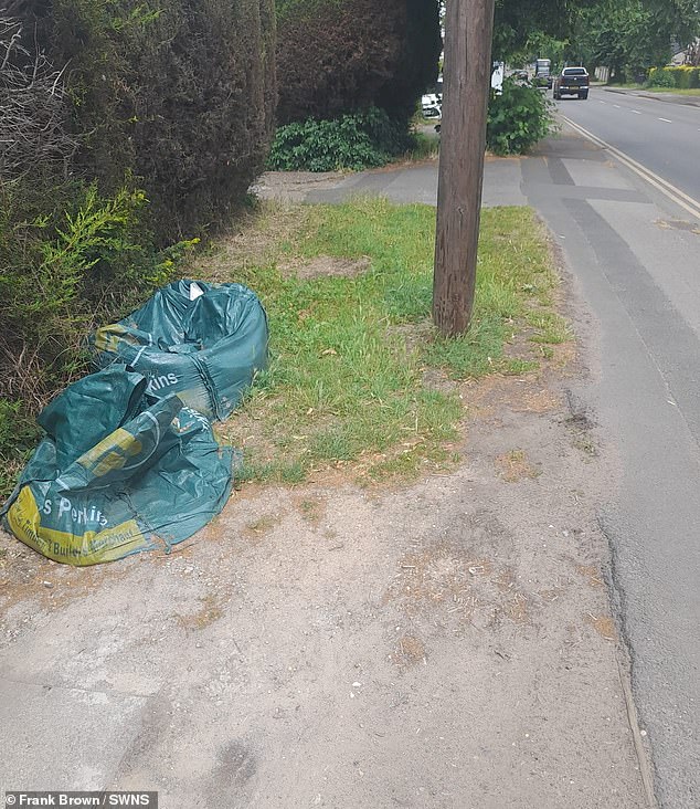 He says he only put two sacks on land to avoid blocking the driveway where he was working