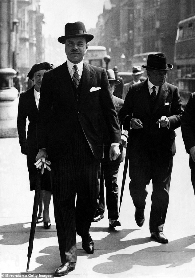 An undated photograph of Mr Simpson dressed sharply in a pin-stripe suit and hat