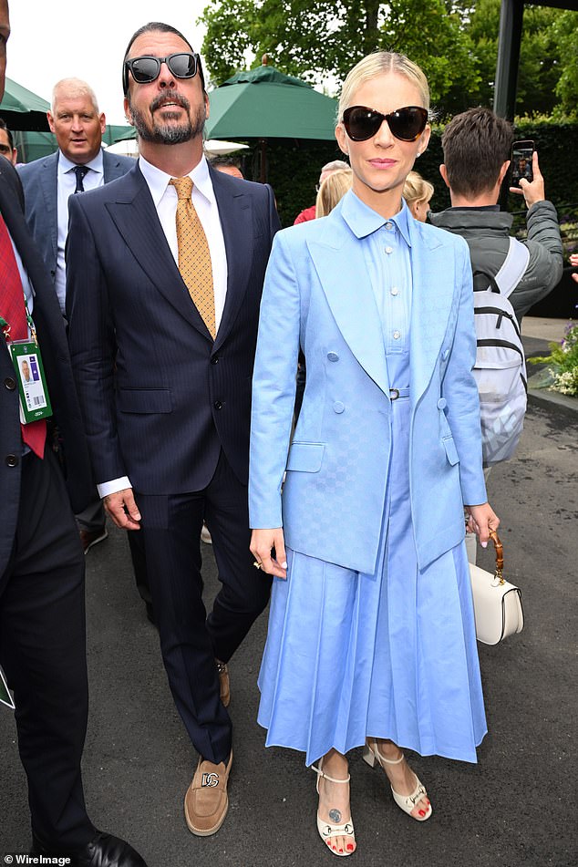 In a full circle moment, the pair had not been seen in public together since last July's outing at the tennis tournament (pictured) when fans noted the rocker appeared 'snappy and irritated'
