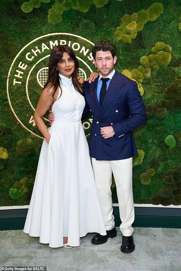 Priyanka, 42, exuded glamour on the outing in a white high necked dress that cinched in at her slender waist. By her side, Nick, 32, looked dapper in a navy blazer and cream chinos