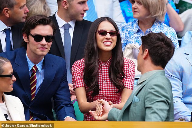 They weren't the only cute couple in attendance, with Olivia Rodrigo enjoying a laugh with boyfriend Louis Partridge - as well as Tom Daley - as they watched the games on Centre Court