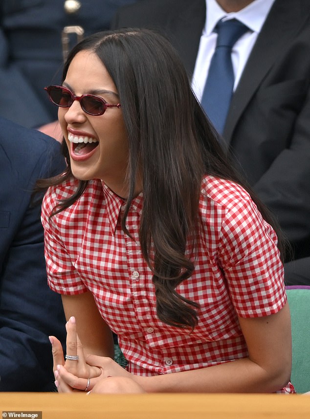 She couldn't contain her giggles as she laughed and joked with her boyfriend