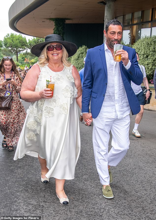 She was joined by her fiancé Rami Hawash, with pair strolling hand in hand together