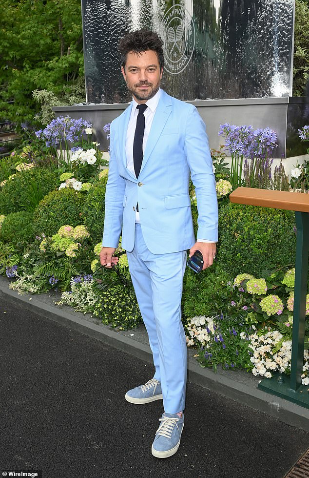 Dominic Cooper opted for a sky blue suit, white shirt and navy tie before completing the look with casual matching blue trainers