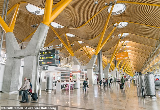 Sources told local media that 'half of the passport control posts were empty, resulting in an average wait of 60 minutes to get through security' this morning. Pictured: Interior of a terminal in Adolfo Suarez Madrid Barajas Airport
