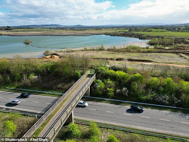 Bedfordshire has seen temperatures peak at 31C (87.8F) over recent four-day heatwave. Pictured: Aerial view of the A505 near the town of Leighton Buzzard