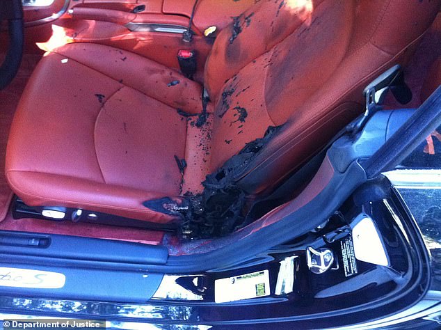 The rapper's car is seen charred after it was lit on fire