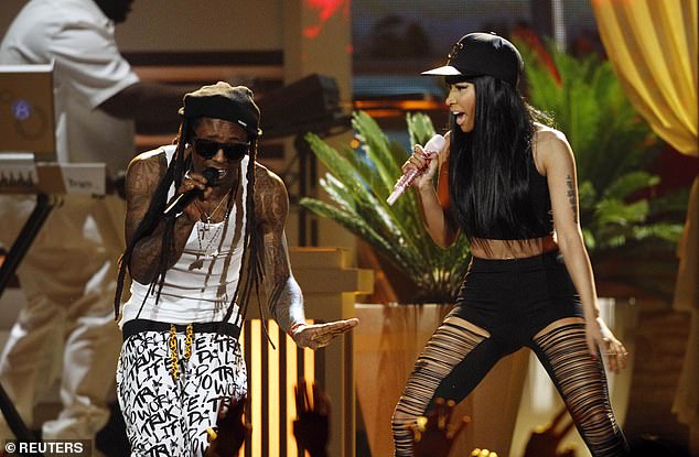 Nicki Minaj, Lil Wayne (pictured in 2013), Rick Ross and Pusha T were all mentioned toward the end of Cassie's cross examination