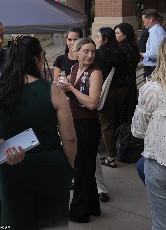 People wait in line to get seats for the Bryan Kohberger plea deal hearing outside the Ada County Courthouse on Wednesday, July 2, 2025, in Boise, Idaho. (AP Photo/Jenny Kane)
