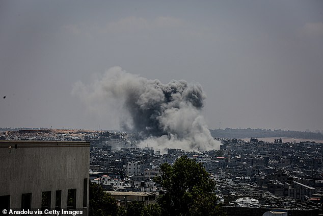 Pictured: Thick plumes of smoke are seen rising following the Israeli army carried out an airstrike targeting the Shujaiya neighborhood in eastern Gaza City, Gaza on July 2