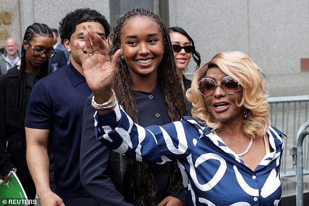 Janice Combs and Chance Combs walk outside after the jury reached its verdict in Diddy's trial