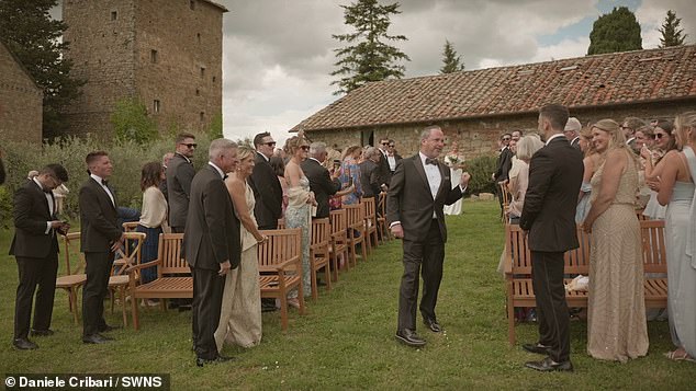 Vinny appears to be surprised but accepts the offer and the trio walk down the aisle together, holding back tears