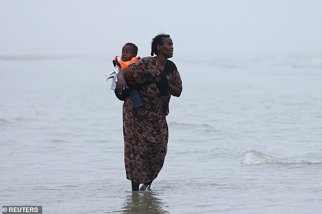 The woman was seen wandering the shore line earlier waiting for the small boat to take her across the Channel