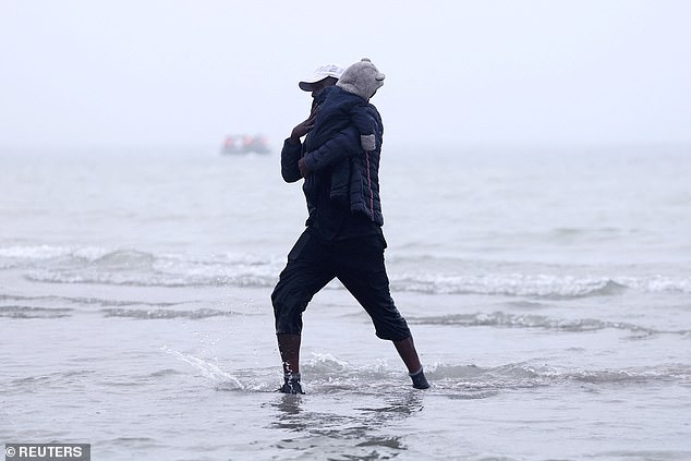 The man with the baby was forced to turn back as the crowded boat set sail for the UK without them