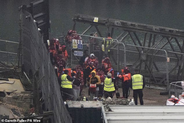 The crowds were seen disembarking still with their life vest on