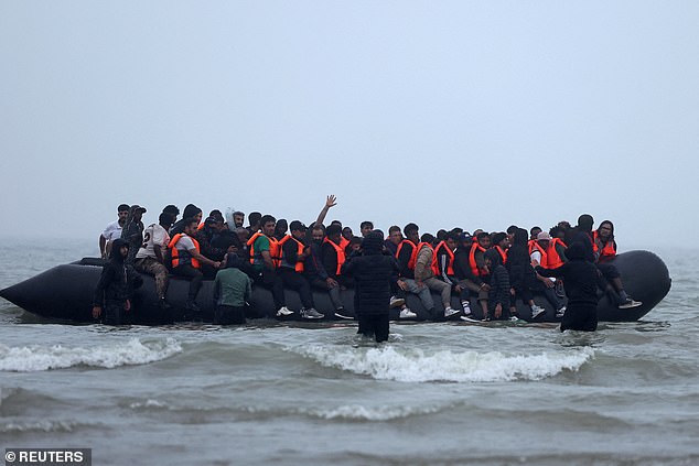 For those who did make it on board, they took a moment to pose for a photo, waving at the photographer on the shore