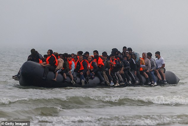 The crammed boat set sail from Gravelines in the fog this morning