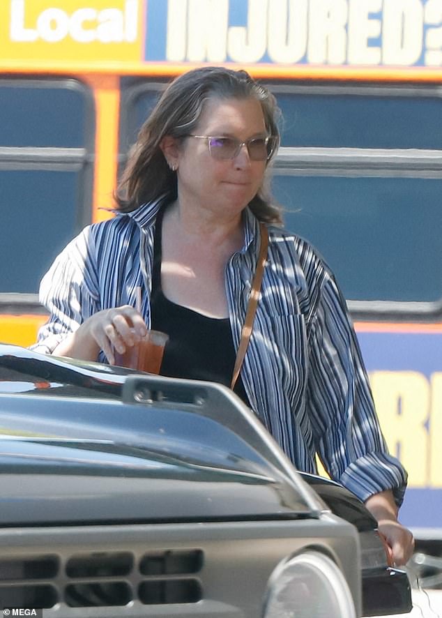The 61-year-old star, whose aunt Jane Fonda vowed to 'raise a ruckus' last month, was casually dressed in a striped button-up shirt and black trousers